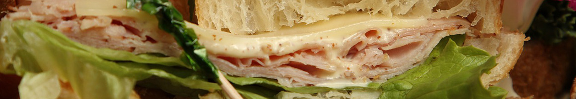 Eating Deli Sandwich at Downtown Deli & Eatery restaurant in Harrisburg, PA.